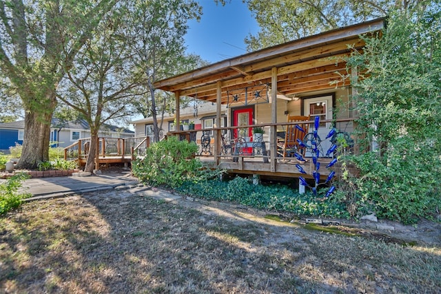view of front of home with a deck