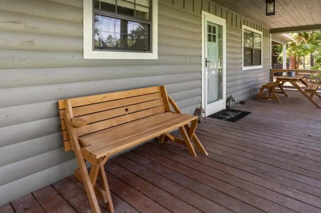 deck featuring covered porch