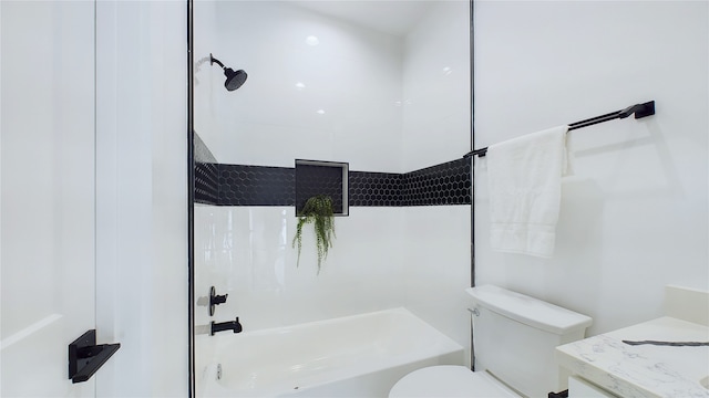 bathroom with shower / bath combination, vanity, and toilet