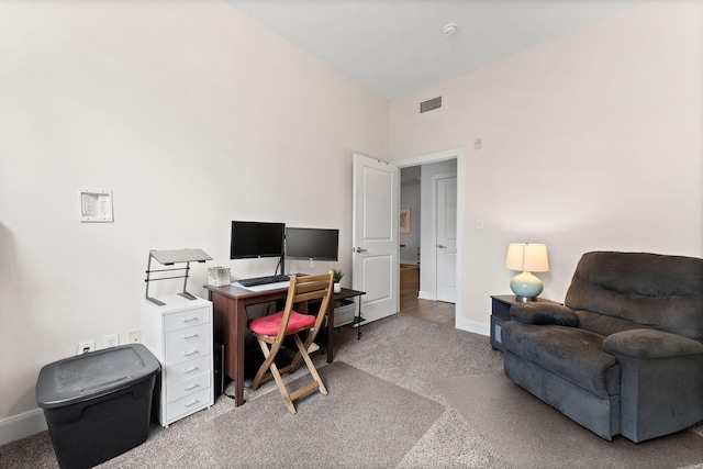 office area with baseboards, carpet, and visible vents