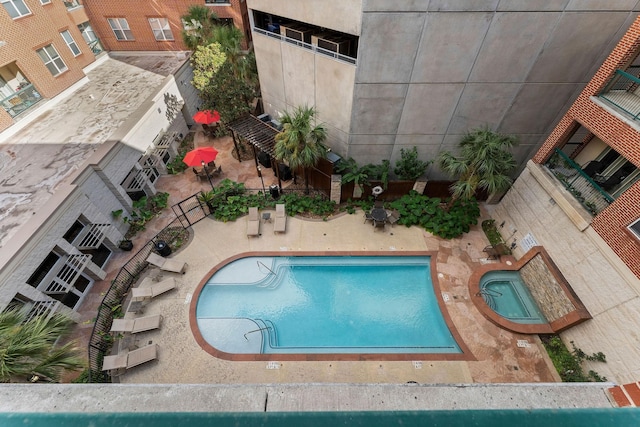 community pool featuring a patio