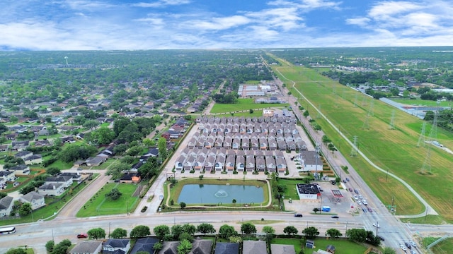 aerial view featuring a residential view and a water view