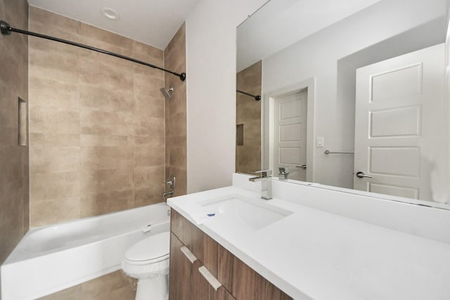 full bathroom featuring shower / bathtub combination, tile patterned floors, vanity, and toilet