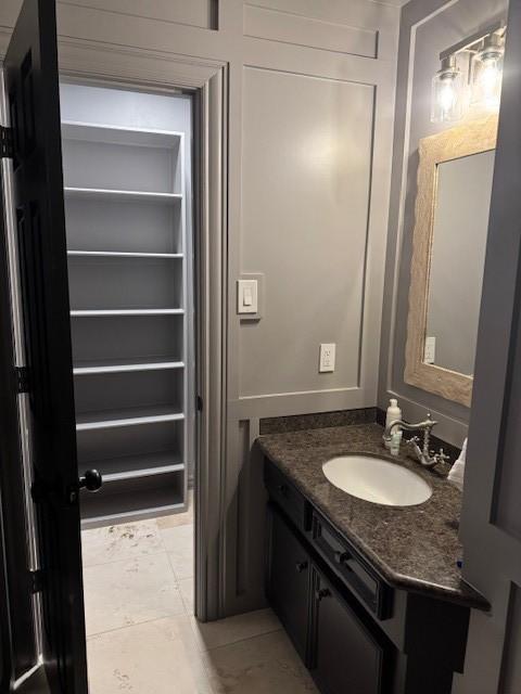 bathroom featuring vanity and tile patterned flooring