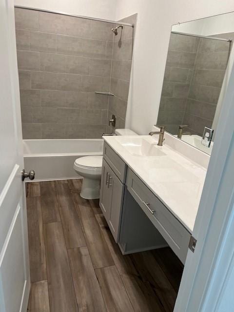 26712 Grandiflora Dr, Magnolia, TX 77355 - full bath with vanity, shower / bath combination, and wood finished floors