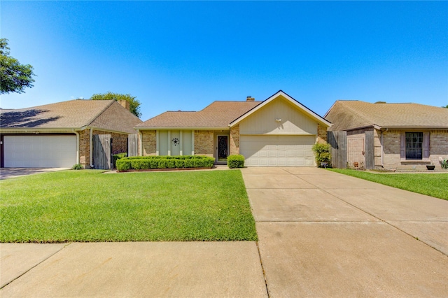 ranch-style house featuring brick siding, an attached garage, and a front yard