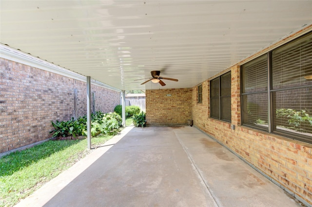 view of patio featuring ceiling fan and fence