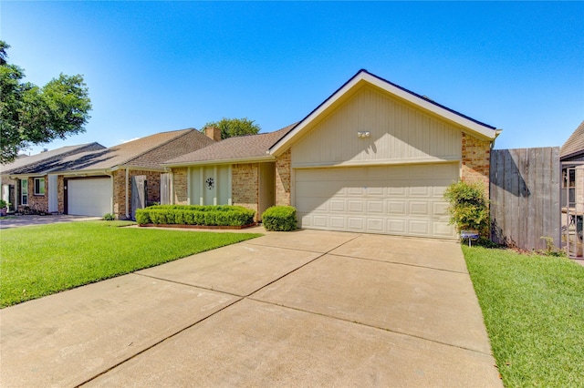 ranch-style home with a front lawn, a chimney, brick siding, concrete driveway, and an attached garage