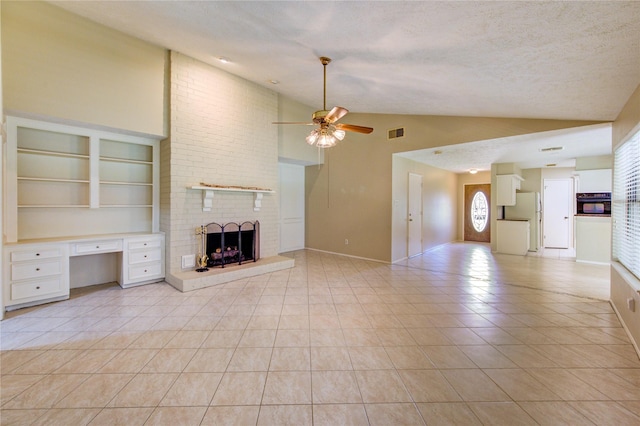 unfurnished living room with visible vents, a fireplace, baseboards, ceiling fan, and vaulted ceiling