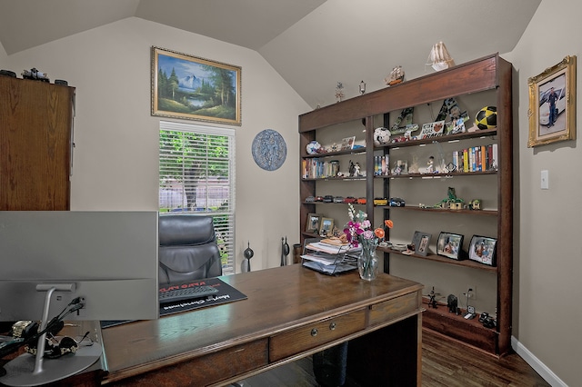 home office with baseboards, wood finished floors, and vaulted ceiling