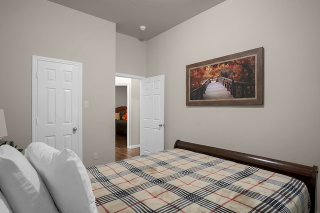 bedroom with wood finished floors
