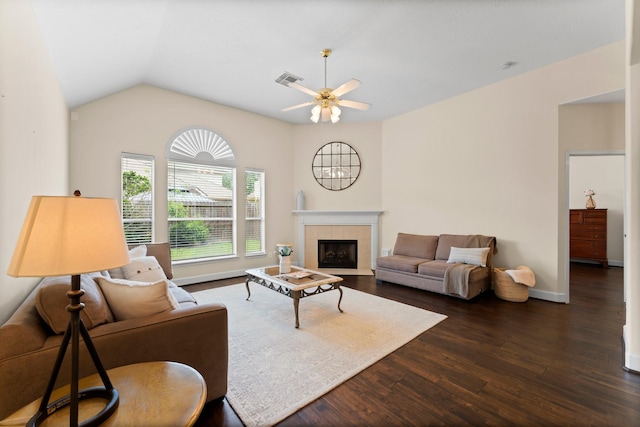 5211 Bur Oak Dr, Pasadena, TX 77505 - living room with ceiling fan, baseboards, a tile fireplace, visible vents, and dark wood-style floors