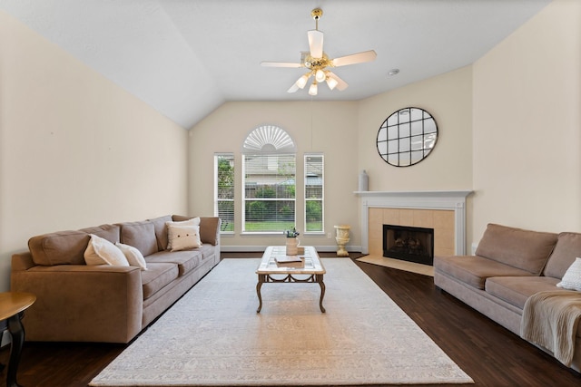 5211 Bur Oak Dr, Pasadena, TX 77505 - living area featuring dark wood-style flooring, ceiling fan, lofted ceiling, and a fireplace