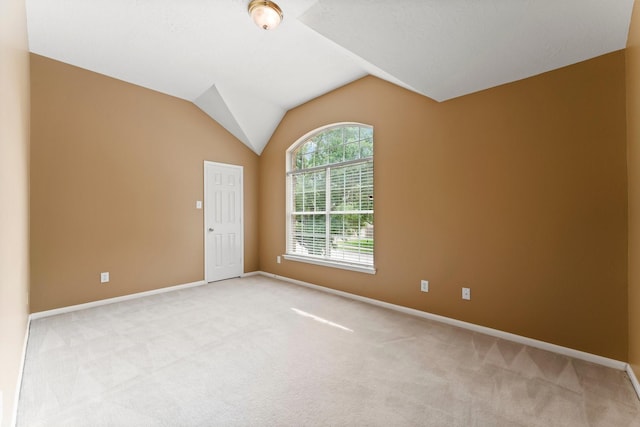 5211 Bur Oak Dr, Pasadena, TX 77505 - carpeted spare room with baseboards and lofted ceiling