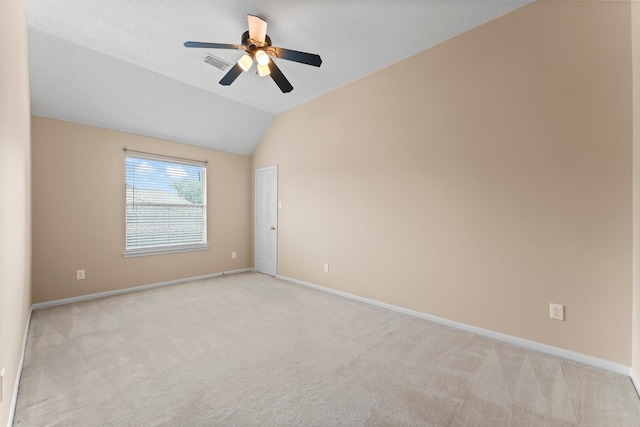 5211 Bur Oak Dr, Pasadena, TX 77505 - spare room featuring ceiling fan, light colored carpet, baseboards, vaulted ceiling, and visible vents