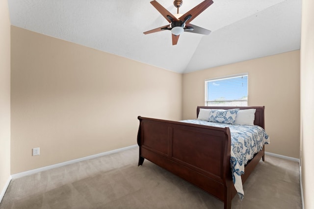 5211 Bur Oak Dr, Pasadena, TX 77505 - bedroom with a ceiling fan, baseboards, vaulted ceiling, and carpet