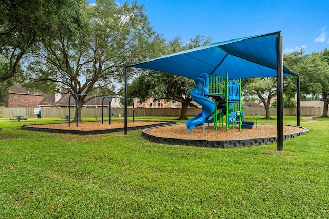 5211 Bur Oak Dr, Pasadena, TX 77505 - communal playground featuring a lawn and fence