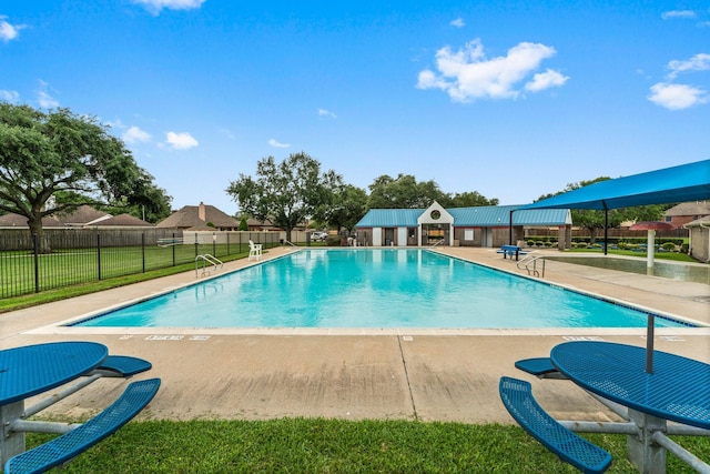 5211 Bur Oak Dr, Pasadena, TX 77505 - pool featuring fence, a patio, and a lawn