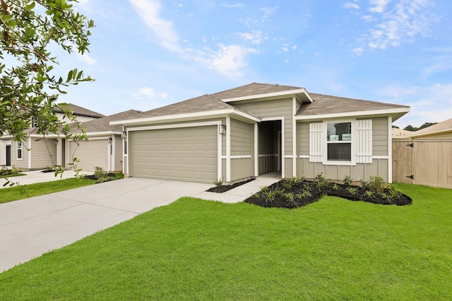 14417 Gray Rocks Rd, Splendora, TX 77372 - prairie-style house featuring board and batten siding, a garage, fence, a front lawn, and concrete driveway