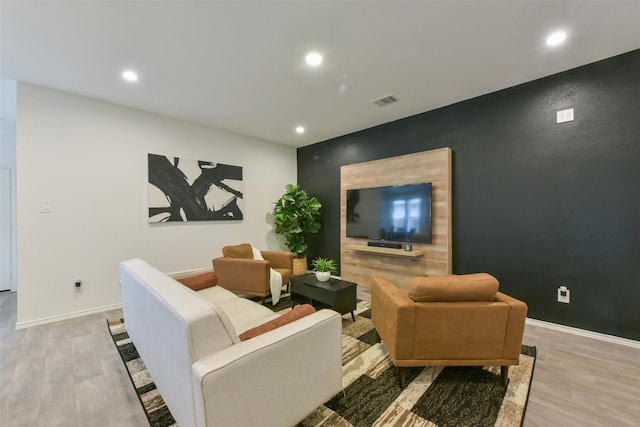 14417 Gray Rocks Rd, Splendora, TX 77372 - living area with baseboards, recessed lighting, light wood-style flooring, and visible vents