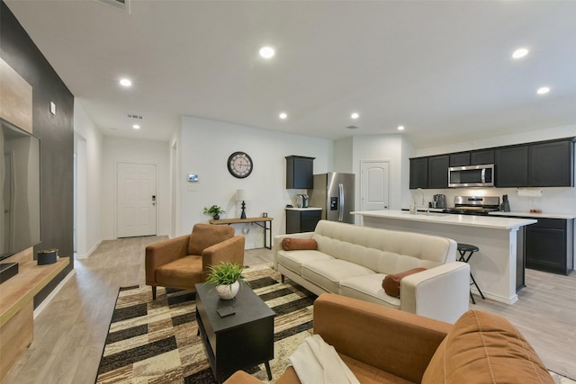 14417 Gray Rocks Rd, Splendora, TX 77372 - living area with recessed lighting and light wood finished floors
