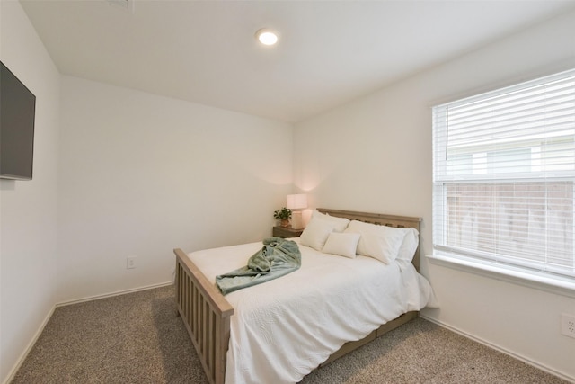 14417 Gray Rocks Rd, Splendora, TX 77372 - carpeted bedroom featuring baseboards