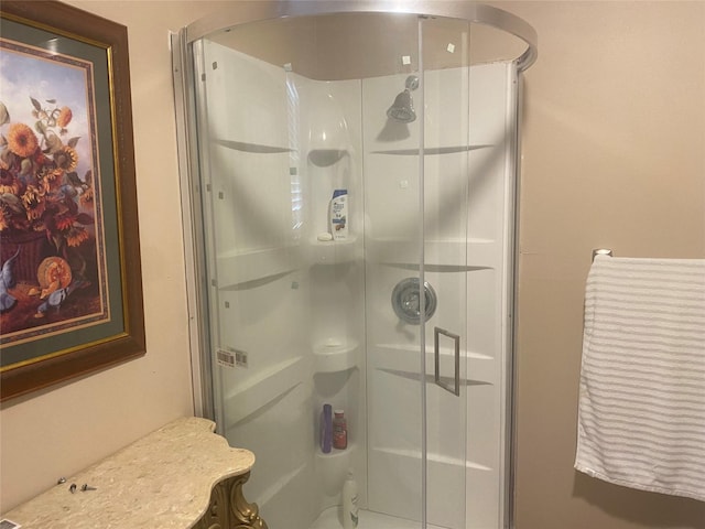 full bathroom with a stall shower