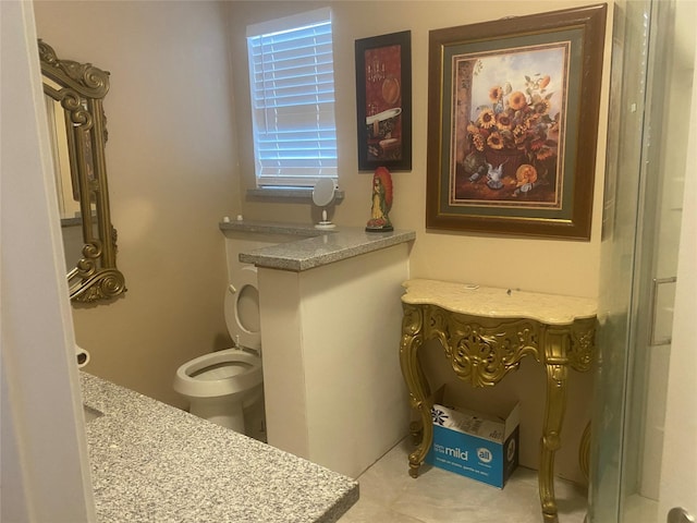 bathroom with a healthy amount of sunlight and vanity