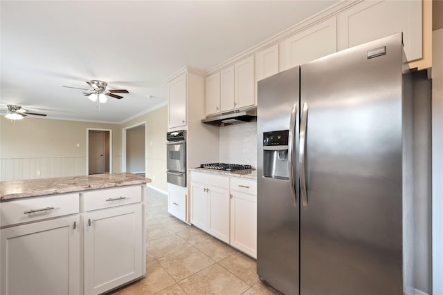 kitchen featuring ceiling fan, crown molding, light tile patterned floors, under cabinet range hood, and stainless steel appliances