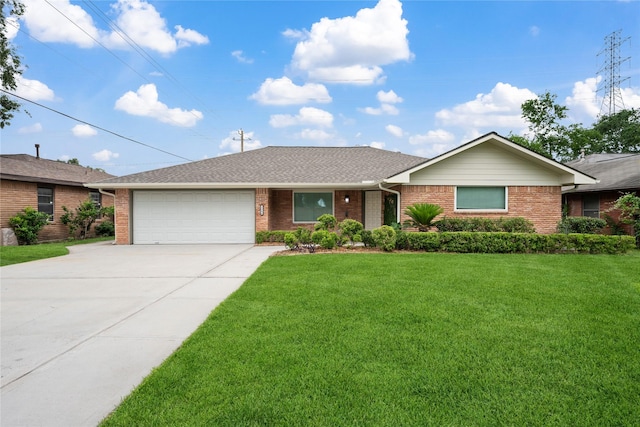 single story home with roof with shingles, a front yard, a garage, brick siding, and concrete driveway
