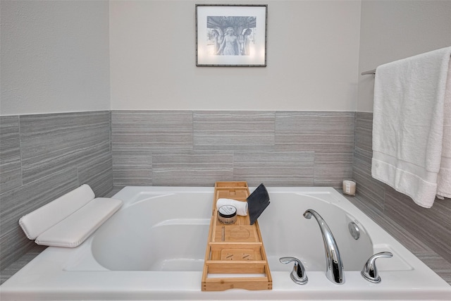 full bath with a garden tub