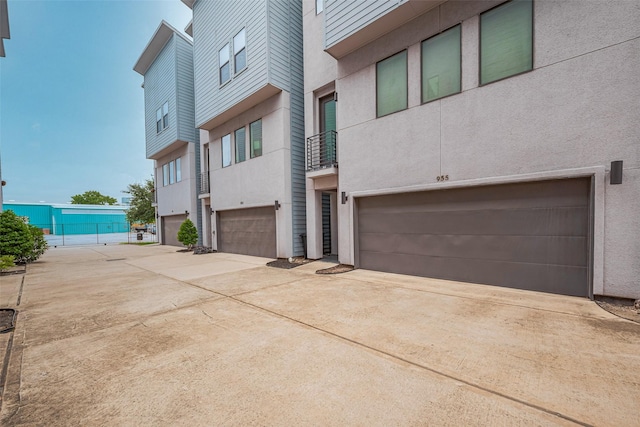 exterior space featuring a garage and driveway