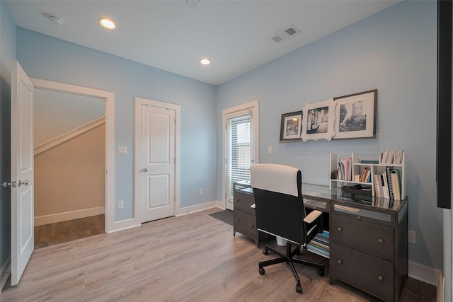 office with recessed lighting, baseboards, visible vents, and light wood-style floors