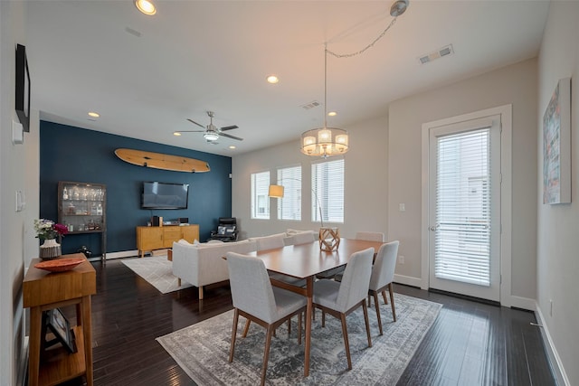 dining room with visible vents, recessed lighting, and dark wood finished floors