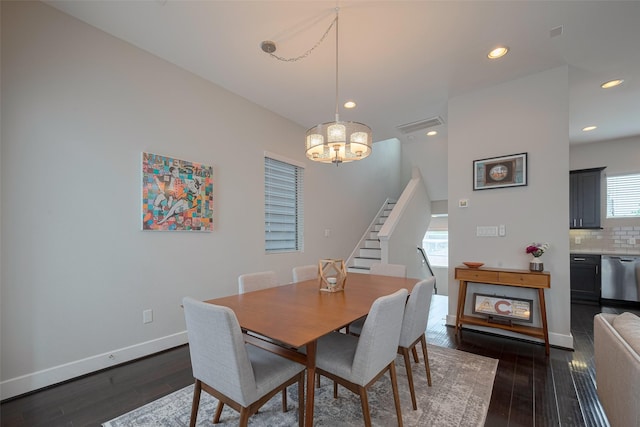 dining space featuring stairway, baseboards, dark wood-style floors, a notable chandelier, and recessed lighting