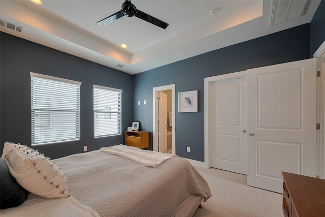 bedroom with visible vents, recessed lighting, and light carpet