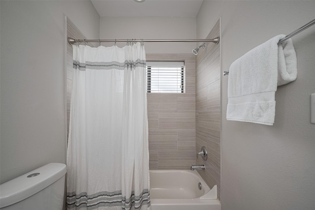 full bathroom with toilet and shower / tub combo