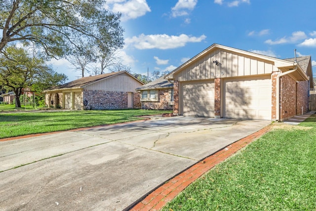 ranch-style home with brick siding, a garage, a front yard, and concrete driveway