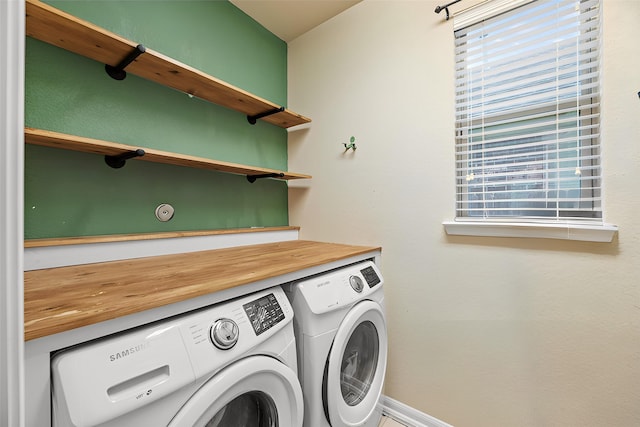 5331 Rue Dela Croix Dr, Katy, TX 77493 - laundry room featuring laundry area, washer and clothes dryer, and baseboards