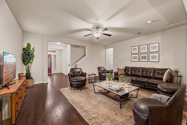 5331 Rue Dela Croix Dr, Katy, TX 77493 - living room featuring visible vents, baseboards, ceiling fan, and dark wood-style floors