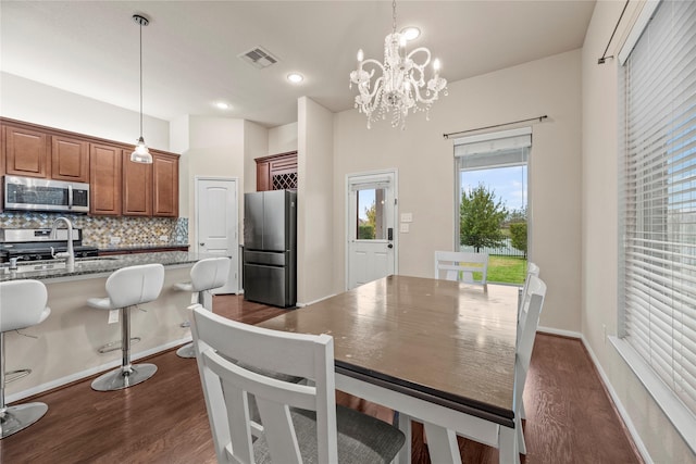 5331 Rue Dela Croix Dr, Katy, TX 77493 - dining room featuring a chandelier, visible vents, dark wood finished floors, and recessed lighting