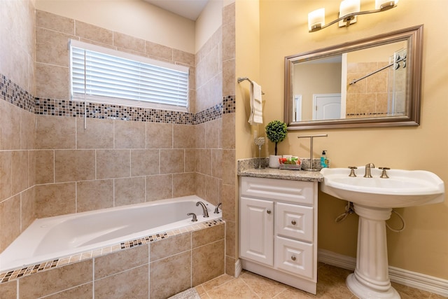 full bath featuring tile patterned floors