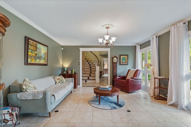 living room with stairs, ornamental molding, a textured ceiling, a chandelier, and light tile patterned floors