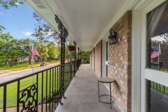 balcony with a porch and visible vents