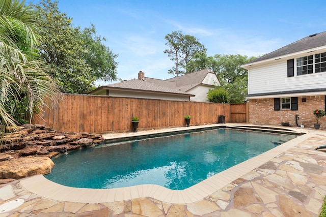 view of pool with a fenced in pool and a fenced backyard