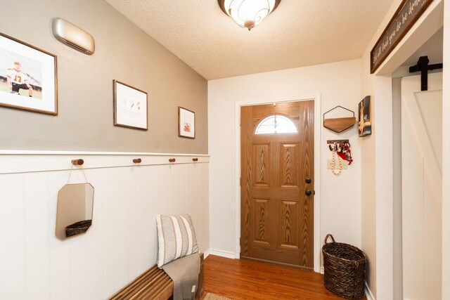 entryway featuring wood finished floors