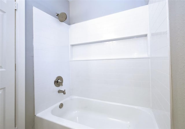 bathroom with shower / bathtub combination