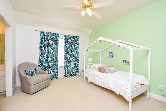 carpeted bedroom with baseboards and a ceiling fan