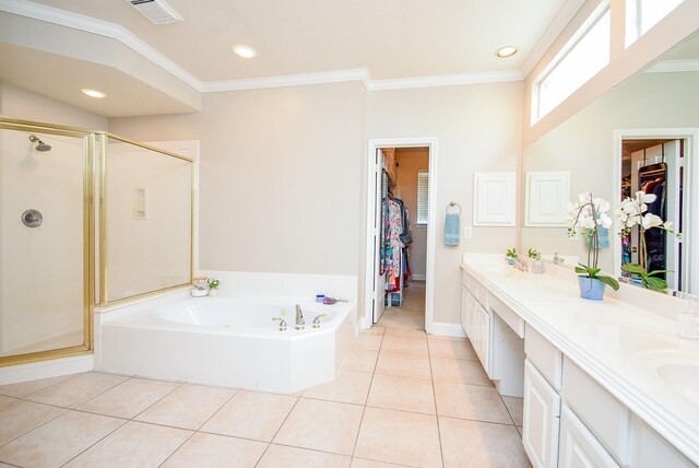 12131 Cielio Bay Ln, Houston, TX 77041 - bathroom featuring a walk in closet, a shower stall, a garden tub, double vanity, and crown molding