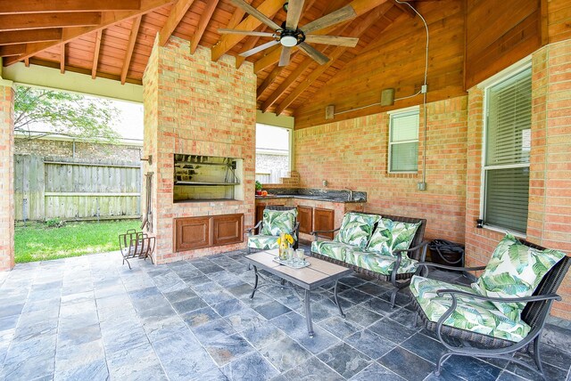 12131 Cielio Bay Ln, Houston, TX 77041 - view of patio / terrace featuring ceiling fan, an outdoor kitchen, and an outdoor hangout area